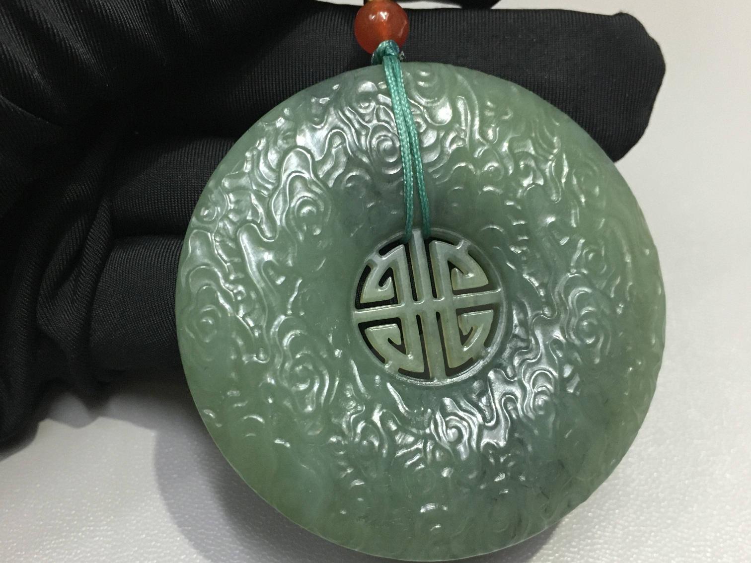 资产处置：天然和田玉仿古祥云平安扣挂件一个转让公告