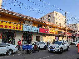 回民区钢铁路金园小区西二层商铺5-16号