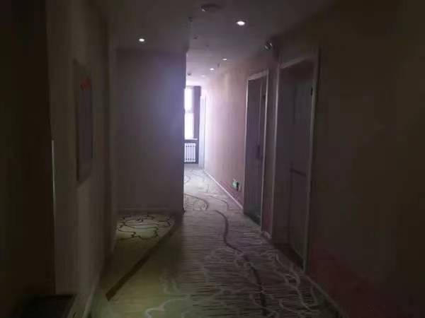 牙克石市永兴办事处民生小区E区18号楼1-09号门市