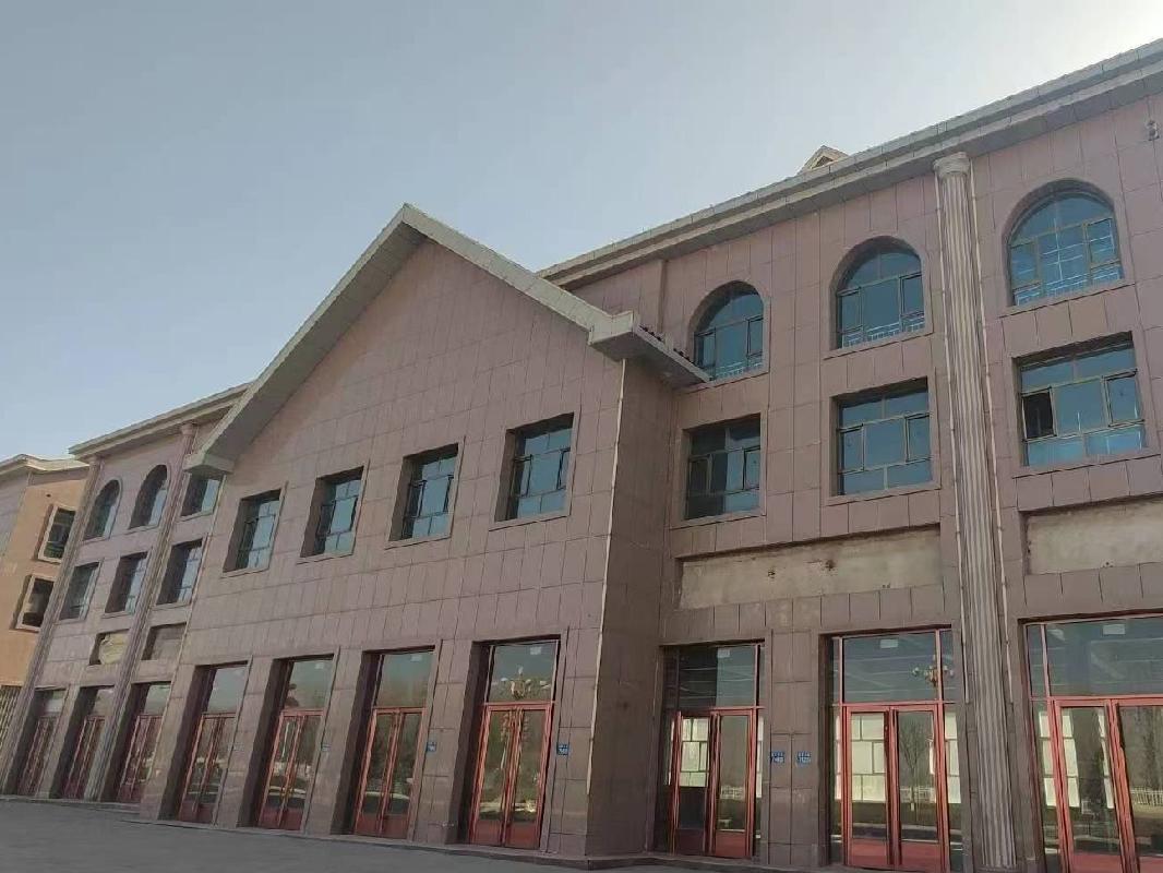 张掖市山丹县一栋综合商业楼转让公告