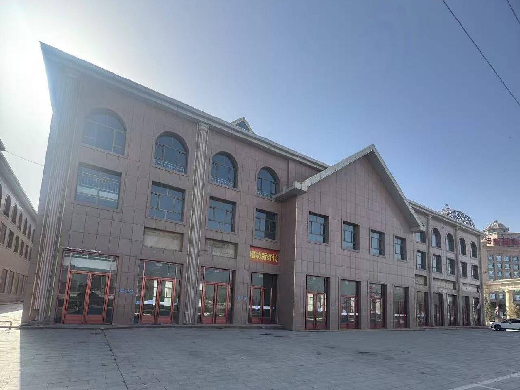 张掖市山丹县一栋综合商业楼转让公告
