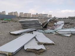 霍尔果斯开建隆安运输有限公司位于霍尔果斯综合保税区设备厂内14间板房及相关设施（已拆除）对外转让(二次挂牌)