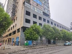 冷水江市江北路金电大厦1-4层 5628.32 平方米商用用房所有权及金电大厦地下10个停车位使用权转让(十二次挂牌)