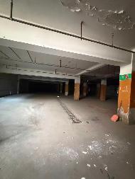 伊犁州财通位于伊宁市银城家苑四期3A底商-1层地下车库约2889.7㎡对外招租，租期三年