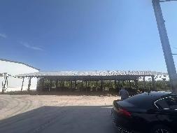 可克达拉市国投公司位于69团7连房屋（建面约2347.95㎡）、水泥地面（约3877.01㎡）以及团部厂区储罐等资产对外转让
