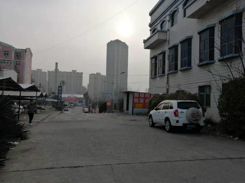 三门峡市崤山路西段南侧的房屋建筑物和土地使用权转让公告
